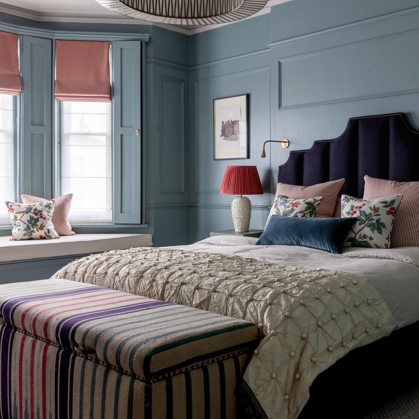 13. Dusty Blue Panelled Bedroom with Blush Accents - blue bedroom ideas