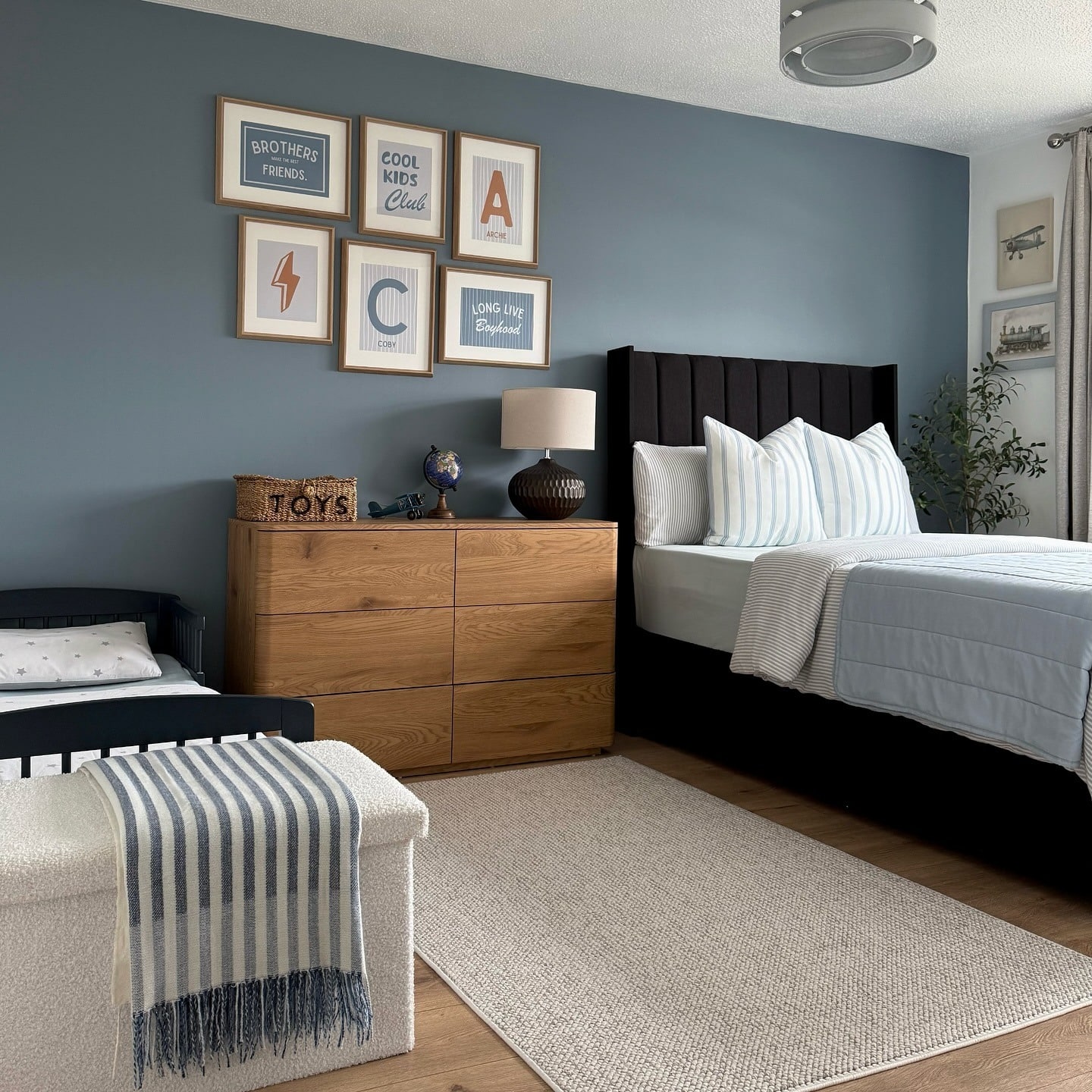 15. Slate Blue Bedroom with Family-Friendly Styling - blue bedroom ideas