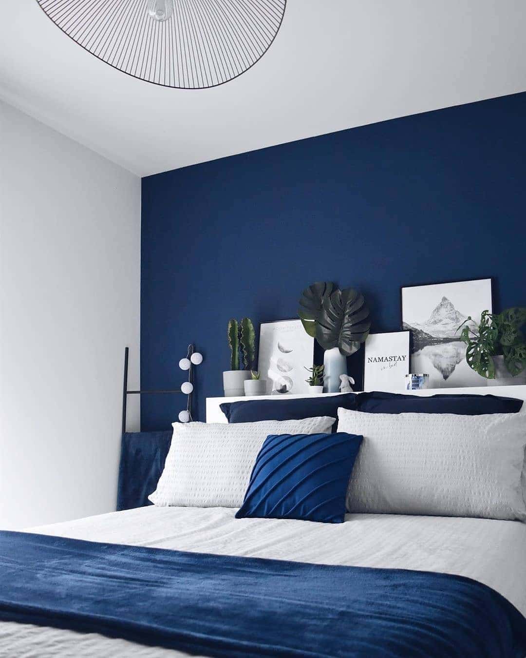 19. Navy Accent Wall with Crisp White Bedding - blue bedroom ideas