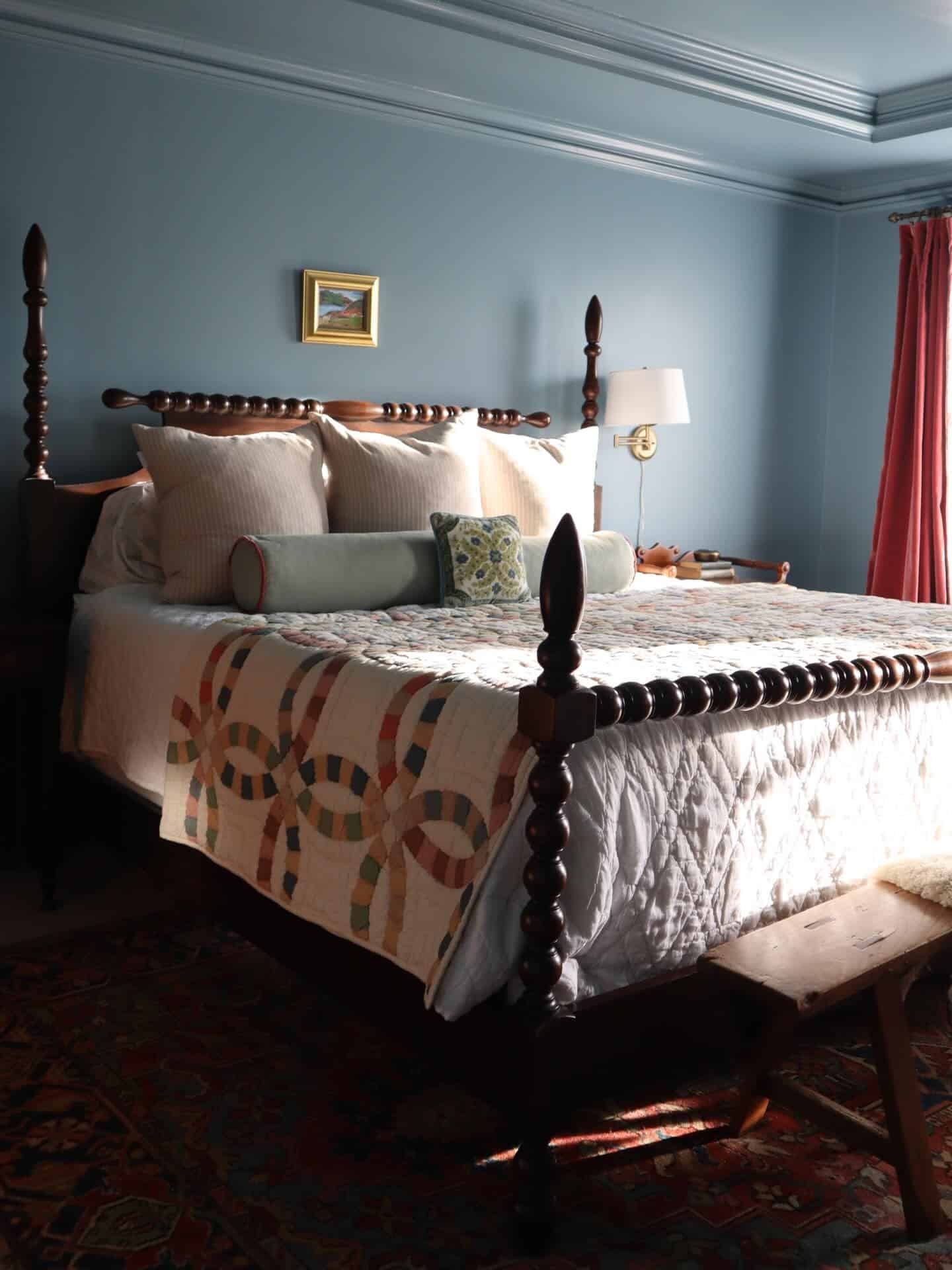 20. Powder Blue Bedroom with Traditional Wooden Bed Frame - blue bedroom ideas