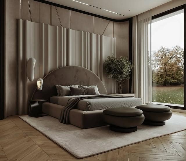 4. Sculptural Beige Bedroom with Organic Curved Headboard - luxury bedroom ideas