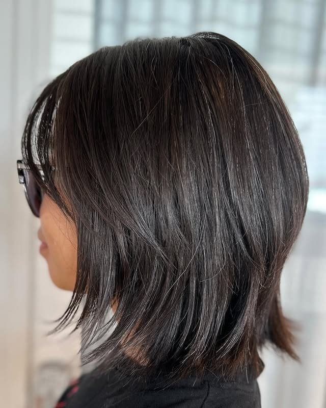 4. Sleek Espresso Shaggy Wolf Lob - Short Wolf Cut