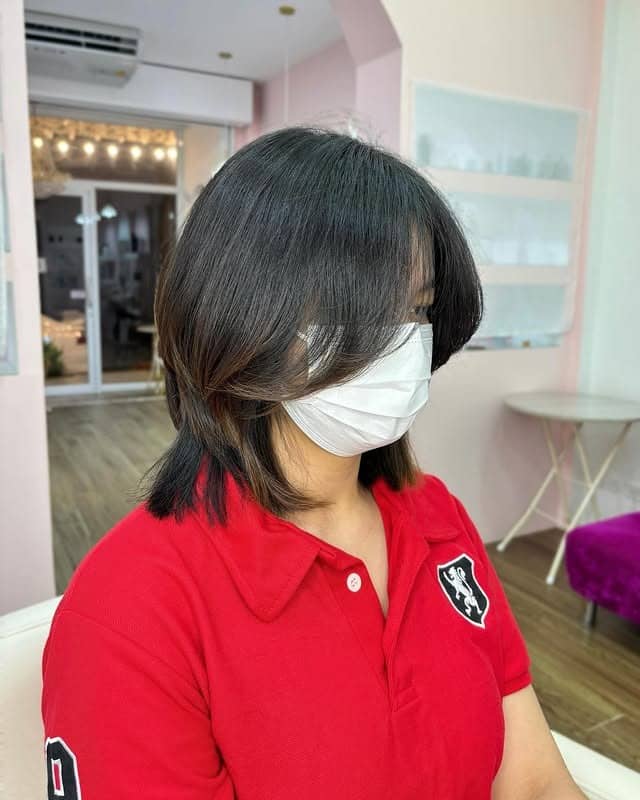 9. Soft Black Layered Wolf Cut with Face-Framing Pieces - Short Wolf Cut