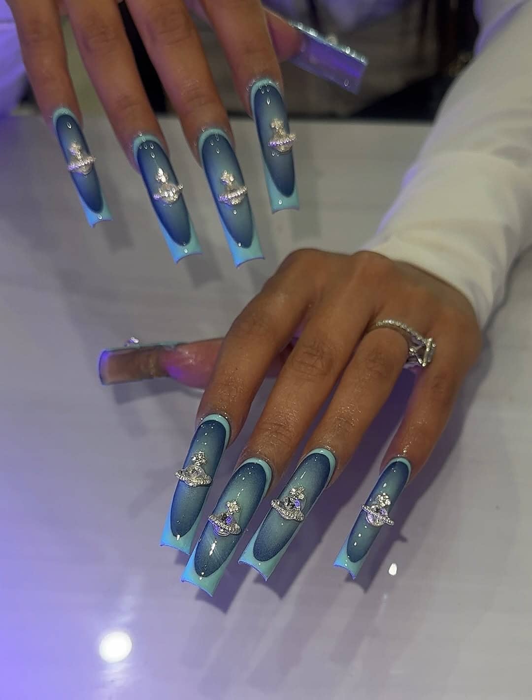 3. Icy Blue Ombre Square Nails with Crystal Embellishments - nail ideas with gems