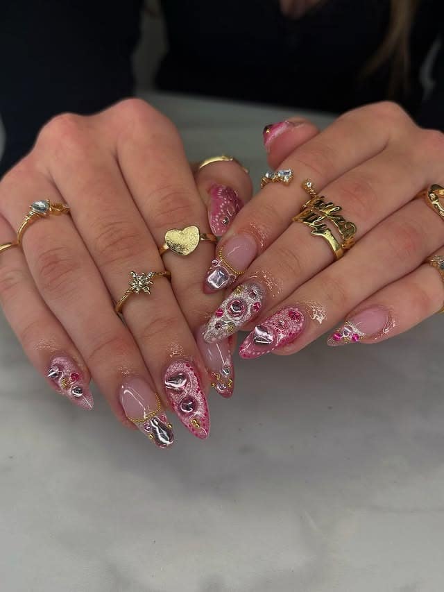 9. Pink Glitter Almond Nails with Gold Outlines and Gem Clusters - nail ideas with gems