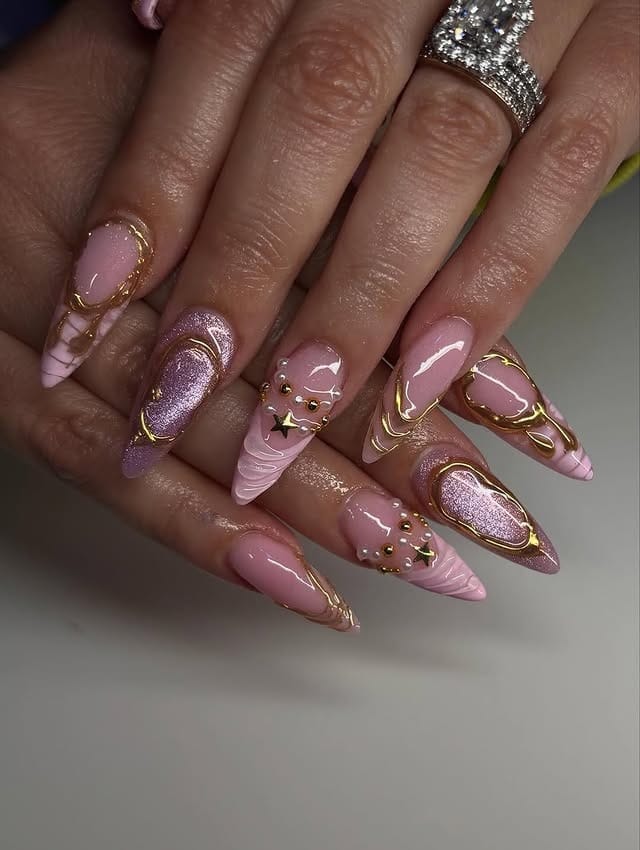 15. Blush Pink Almond Nails with Gold Chrome Swirls and Studded Gems - nail ideas with gems