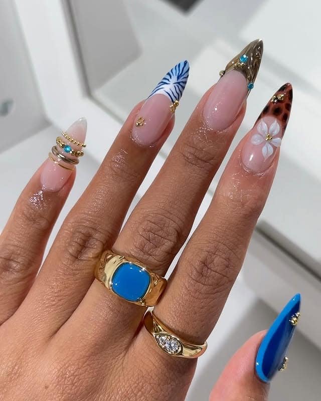 16. Neutral Almond Nails with Blue, Tortoiseshell, and Gem Accents - nail ideas with gems