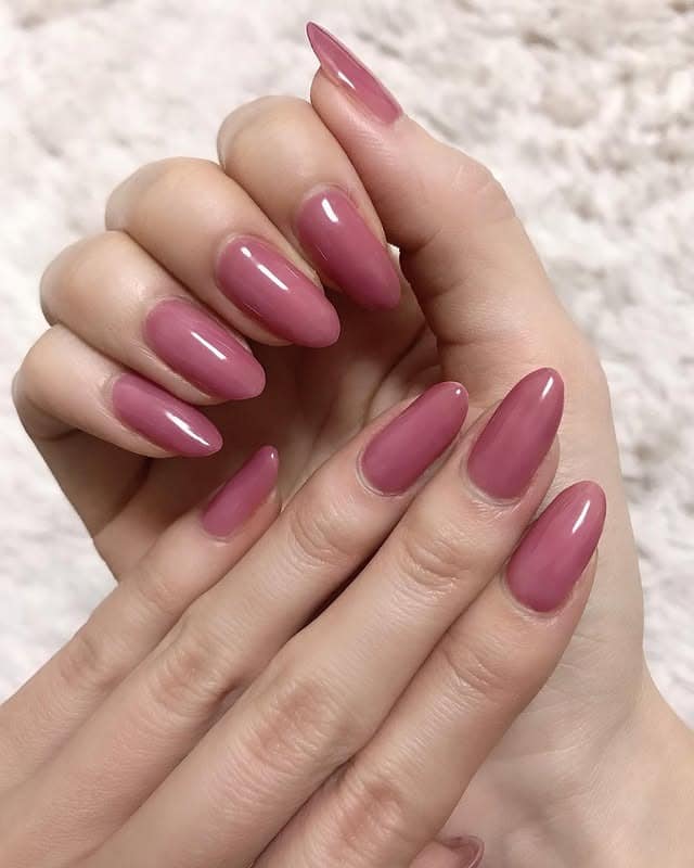 2. Glossy Rose Pink Almond Nails - one color nail ideas