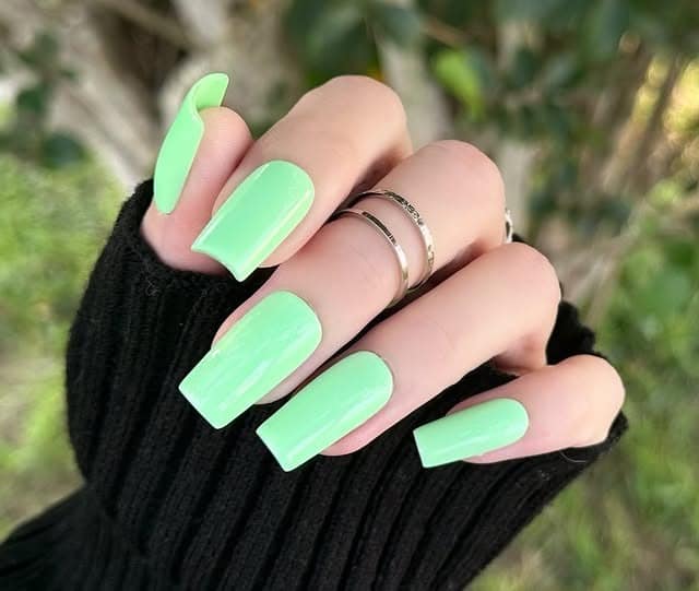 5. Pastel Green Long Square Nails - one color nail ideas