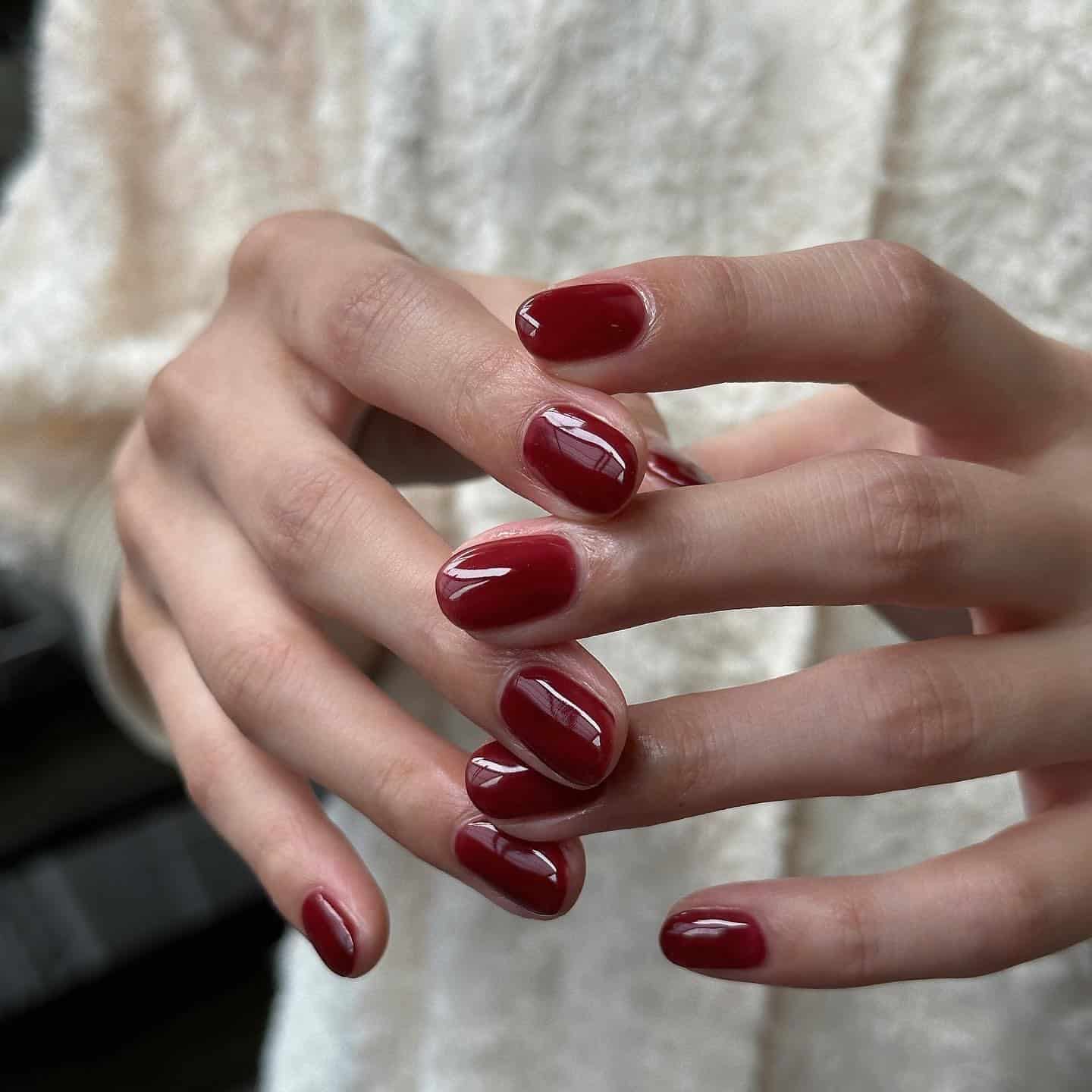 11. Classic Cherry Red Short Oval Nails - one color nail ideas