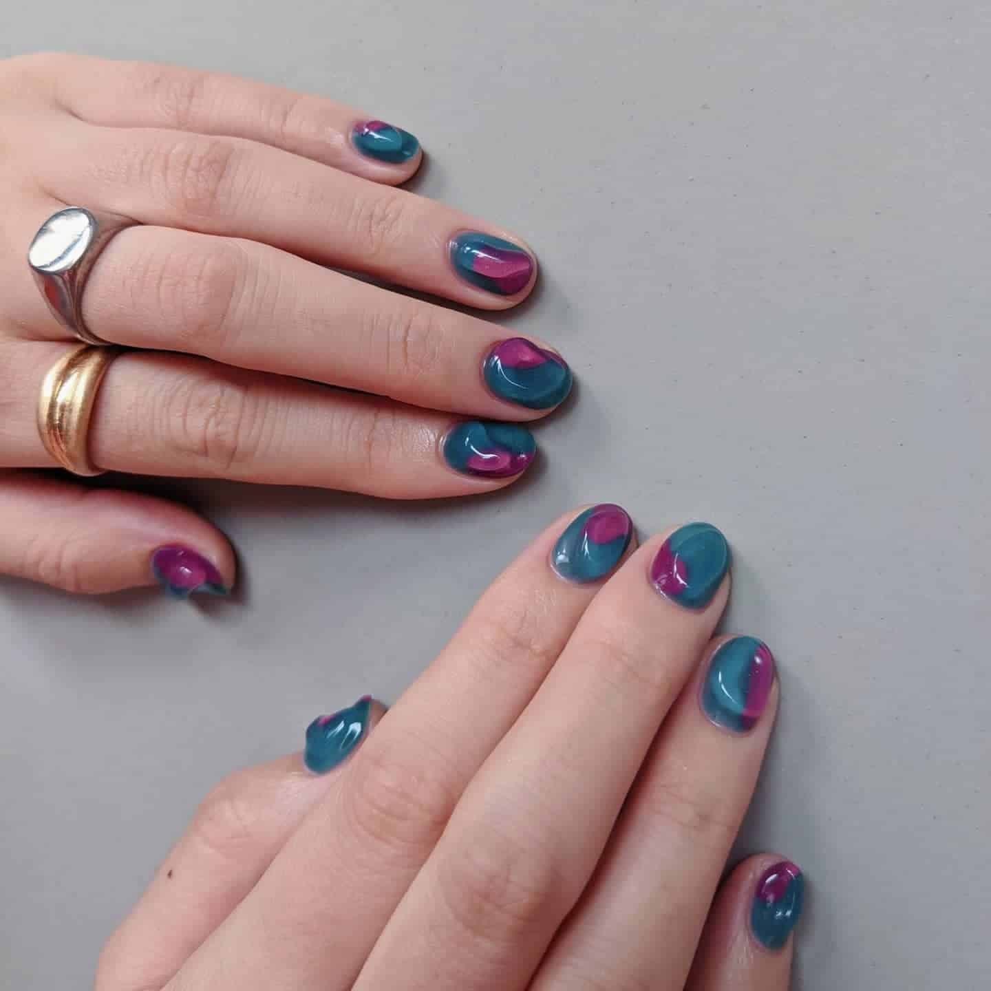 12. Teal and Magenta Abstract Short Round Nails - one color nail ideas