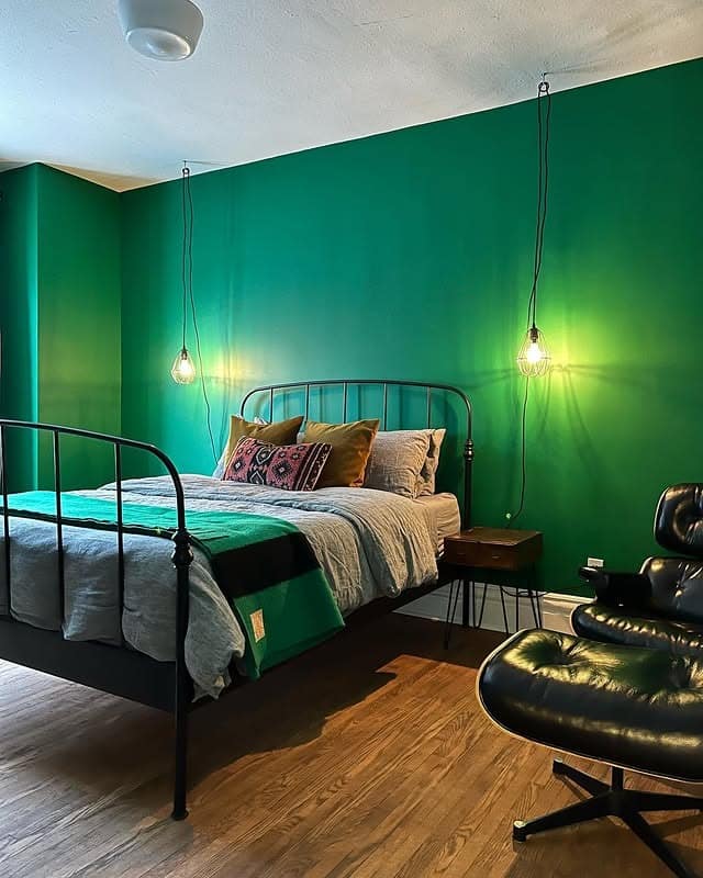 10. Industrial Emerald Bedroom with Minimal Lighting - emerald green bedroom ideas