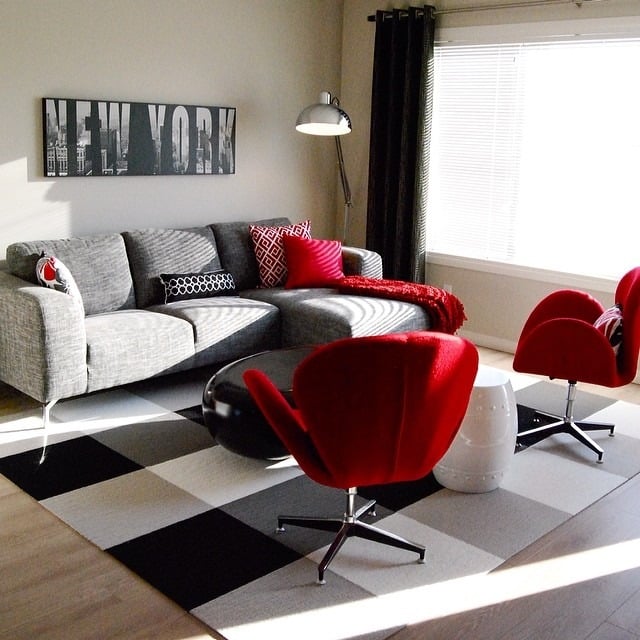 1. Modern Gray Sofa with Bold Red Accent Chairs - gray and red living room ideas