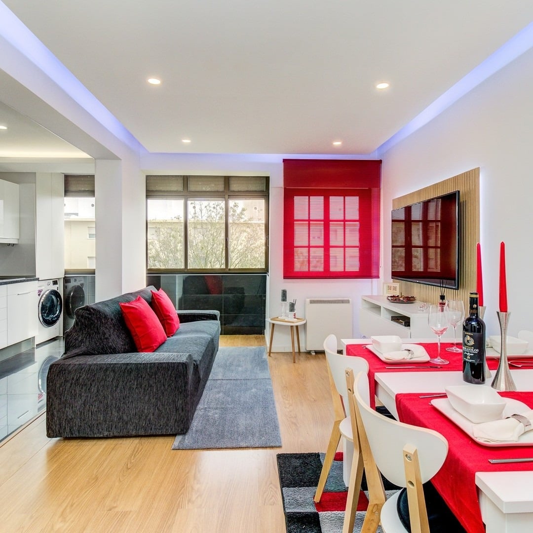 2. Compact Open-Plan Living with Red Highlights - gray and red living room ideas