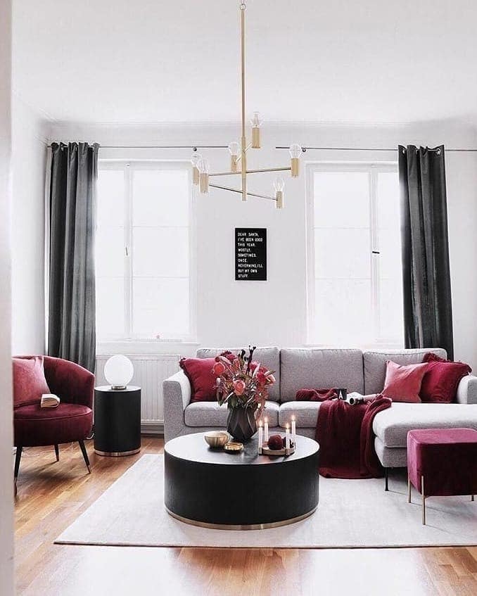 16. Minimalist Gray Lounge with Soft Red Layering - gray and red living room ideas