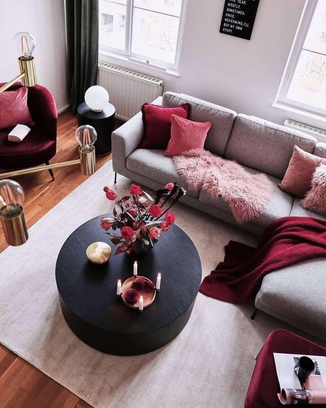 17. Cozy Gray Sofa with Blush and Deep Red Accents - gray and red living room ideas