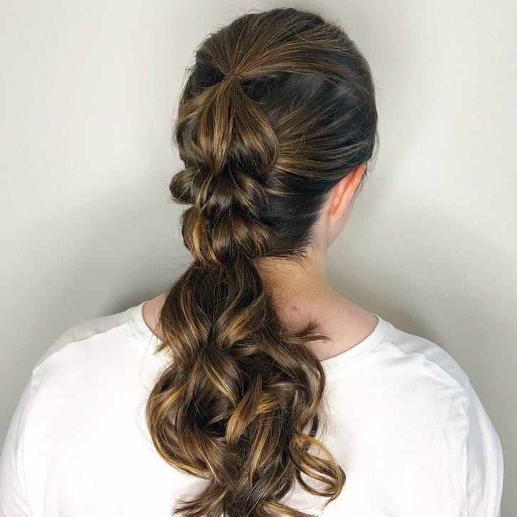 3. Textured Brunette Braided Layered Ponytail - Layered Ponytail Hairstyles