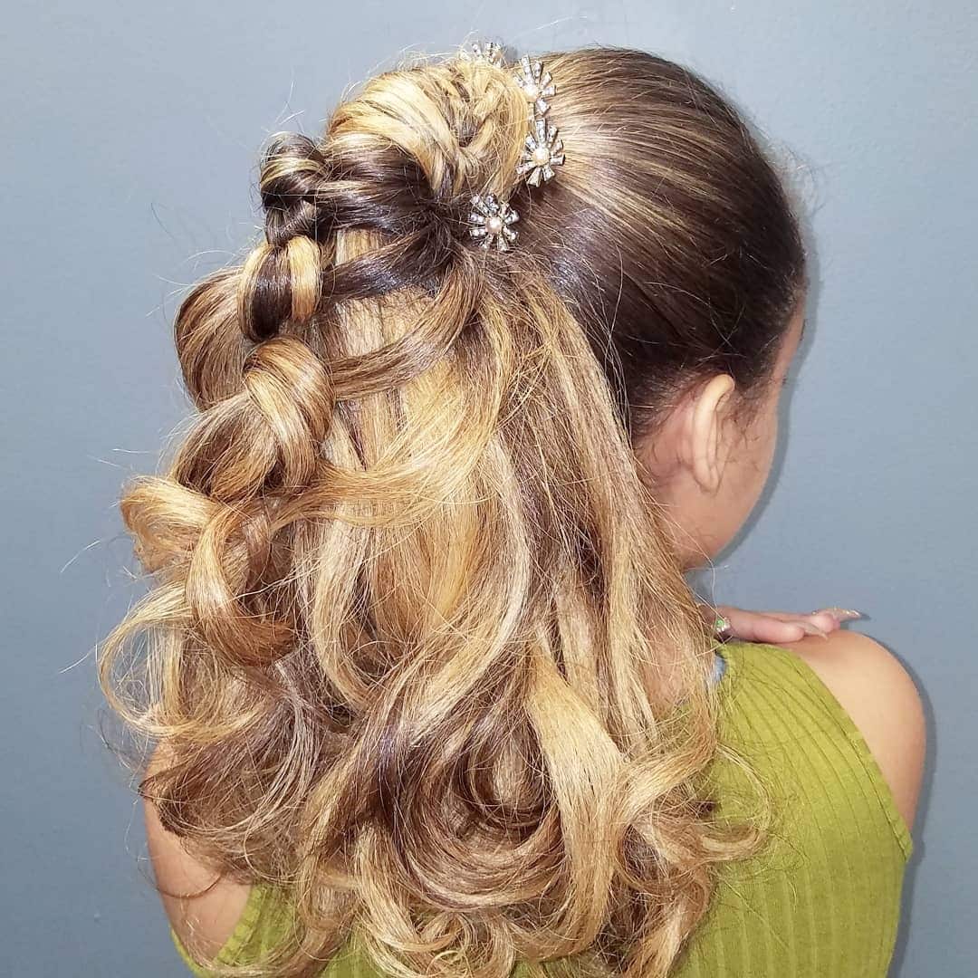 4. Golden Blonde Sculpted Layered Ponytail - Layered Ponytail Hairstyles