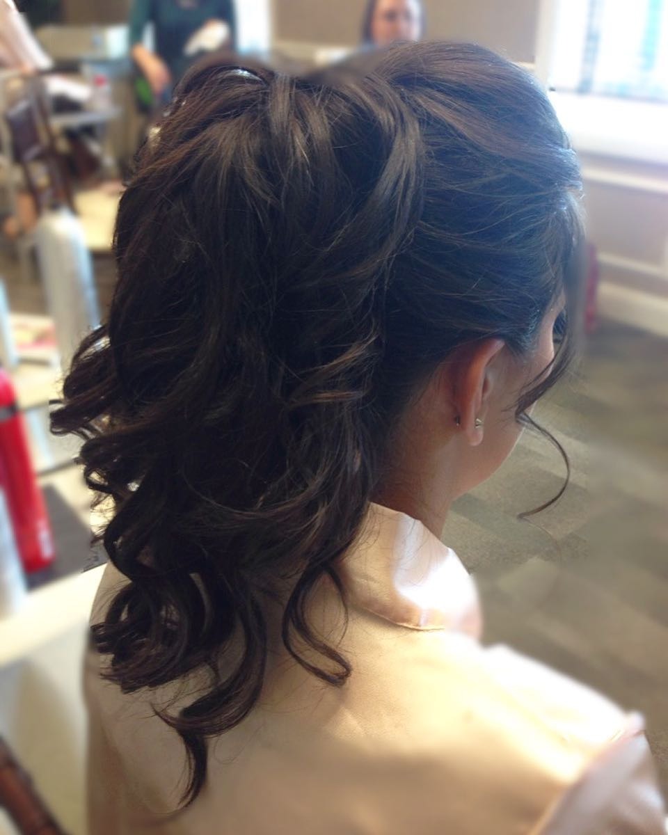 8. Dark Chocolate Curled Layered Ponytail - Layered Ponytail Hairstyles