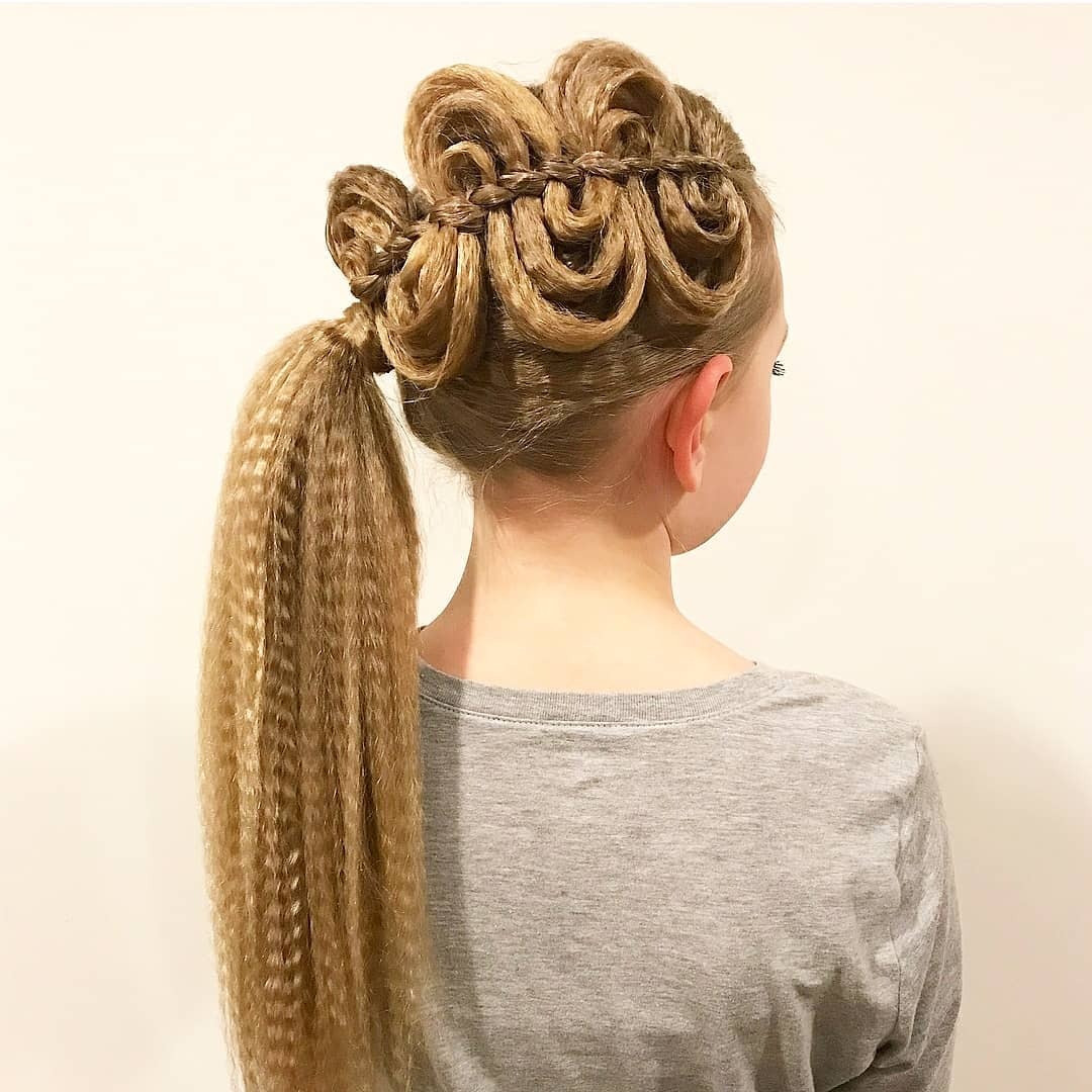 9. Sleek Brunette Twisted Layered Ponytail - Layered Ponytail Hairstyles