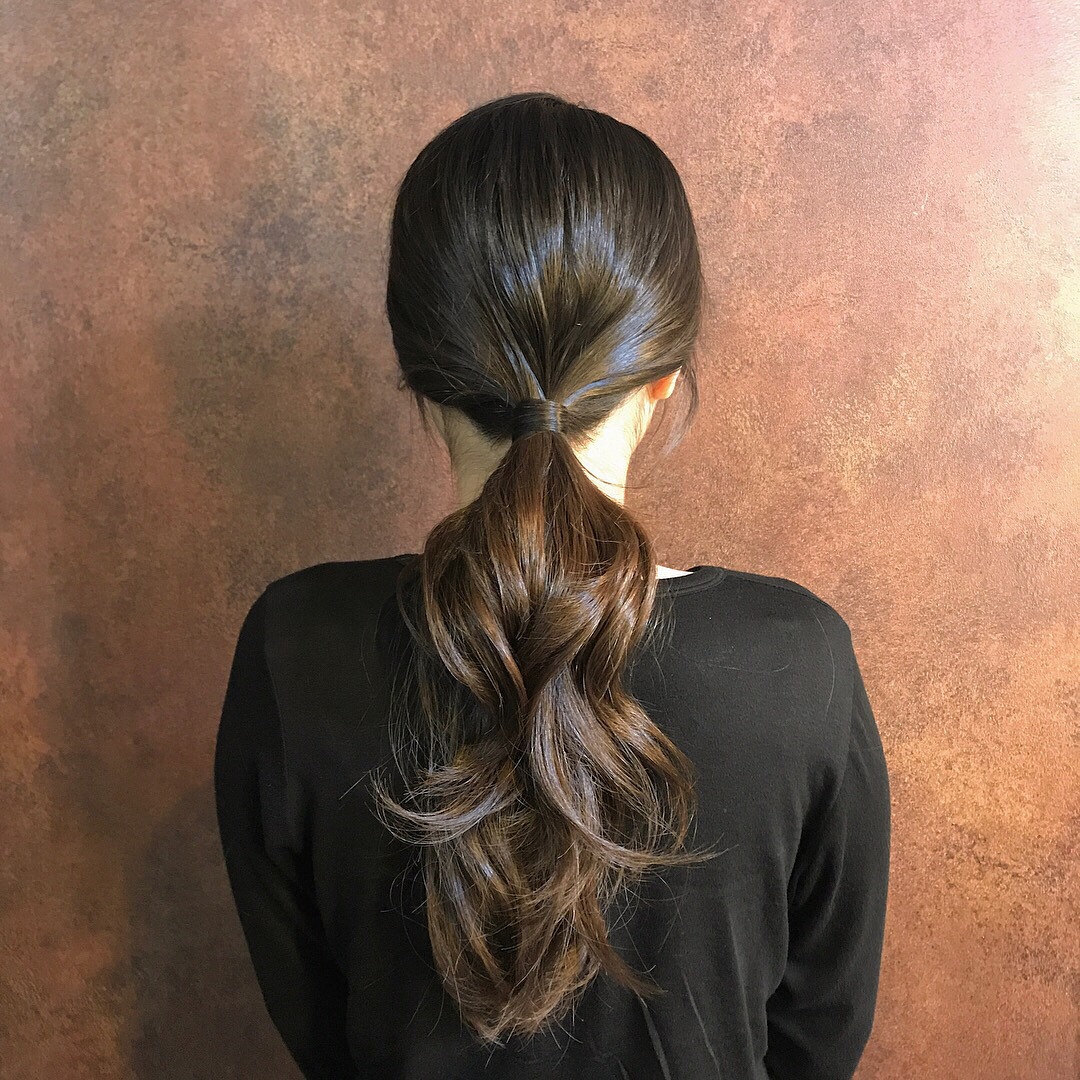 10. Creative Braided Crown with Long Textured Layered Ponytail - Layered Ponytail Hairstyles