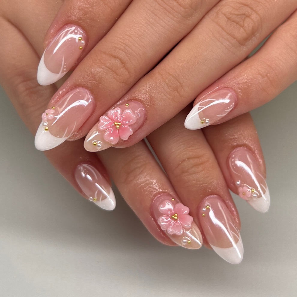 1. Soft Pink French Tips with 3D Blossom Accents - cute nail ideas