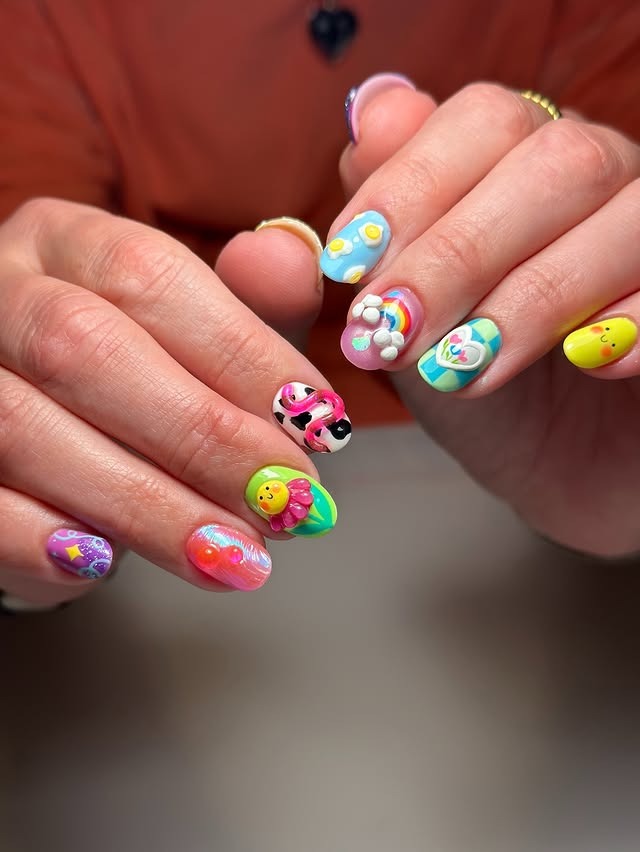 11. Colorful 3D Cartoon Mix & Match Nails - cute nail ideas