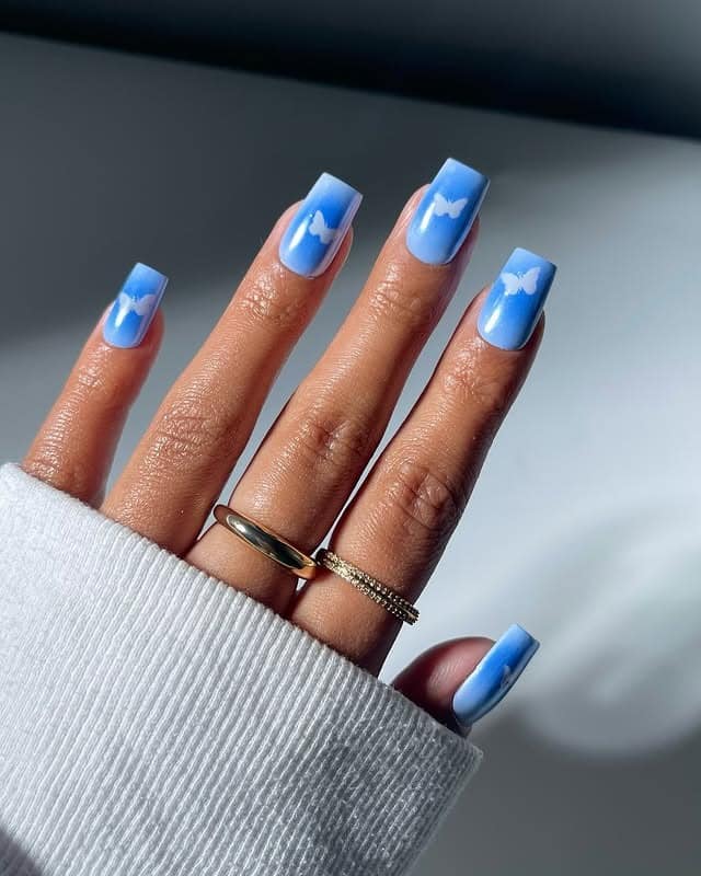 5. Cloud-Inspired Blue Square Nails - blue spring nail ideas