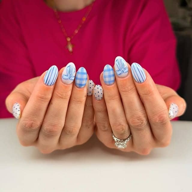 6. Blue Mixed Pattern Almond Nails - blue spring nail ideas