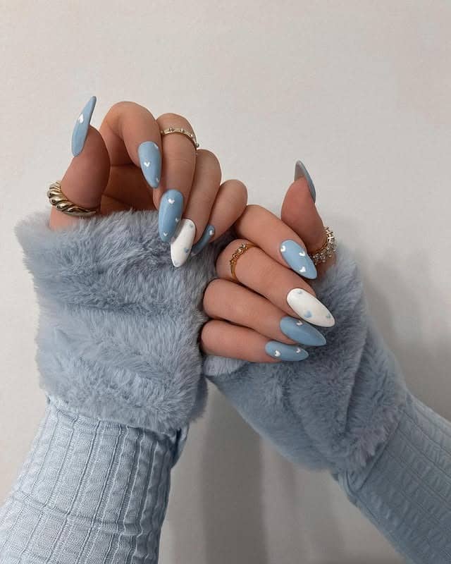 14. Dusty Blue Heart Accent Almond Nails - blue spring nail ideas