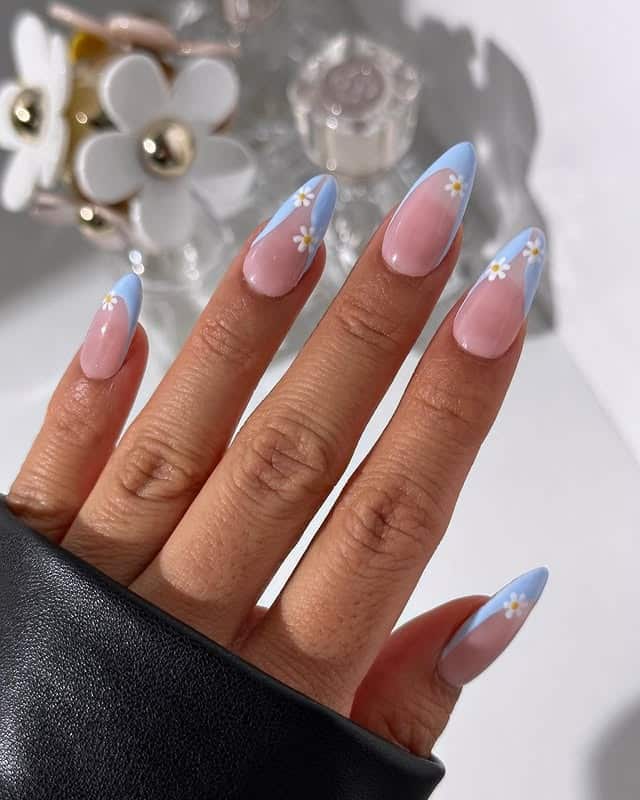 16. Pastel Blue Daisy French Tip Almond Nails - blue spring nail ideas