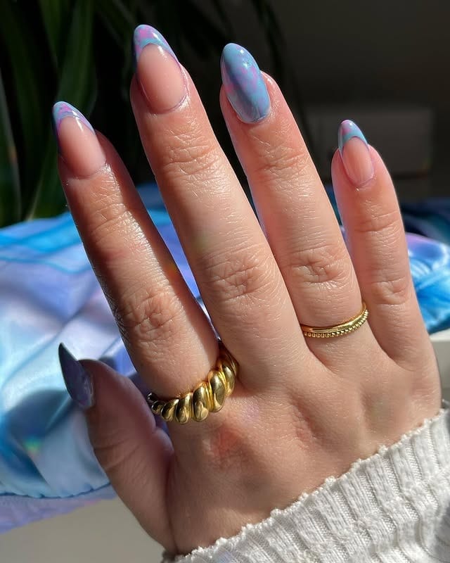 18. Abstract Blue Marble French Almond Nails - blue spring nail ideas