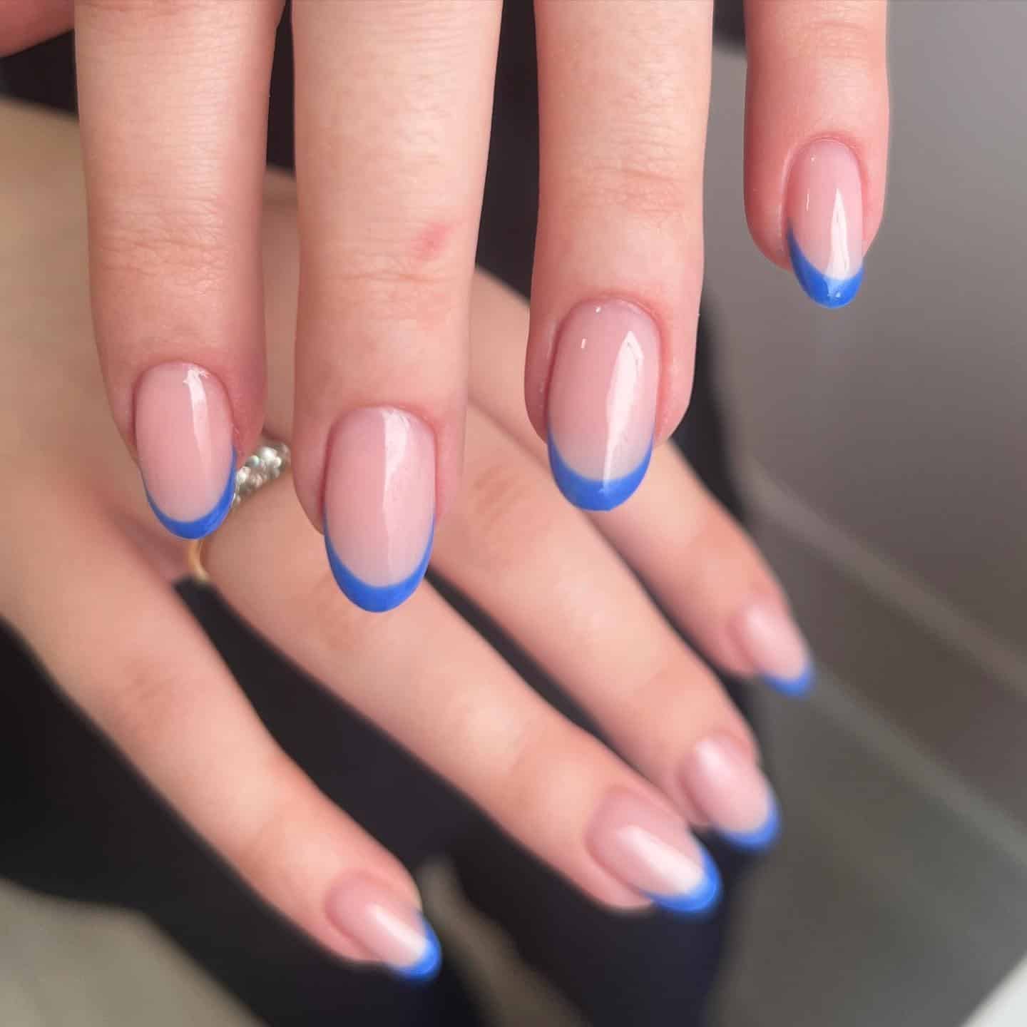 20. Classic Blue French Tip Short Oval Nails - blue spring nail ideas