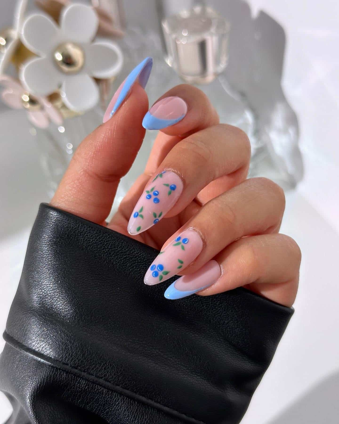 22. Baby Blue French Tip Floral Almond Nails - blue spring nail ideas