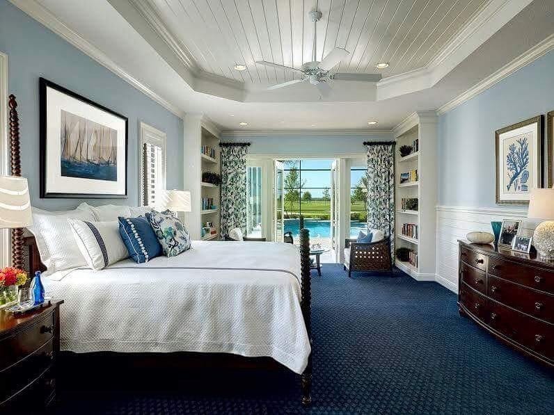 1. Coastal Light Blue Bedroom with Dark Contrast Flooring - light blue bedroom ideas