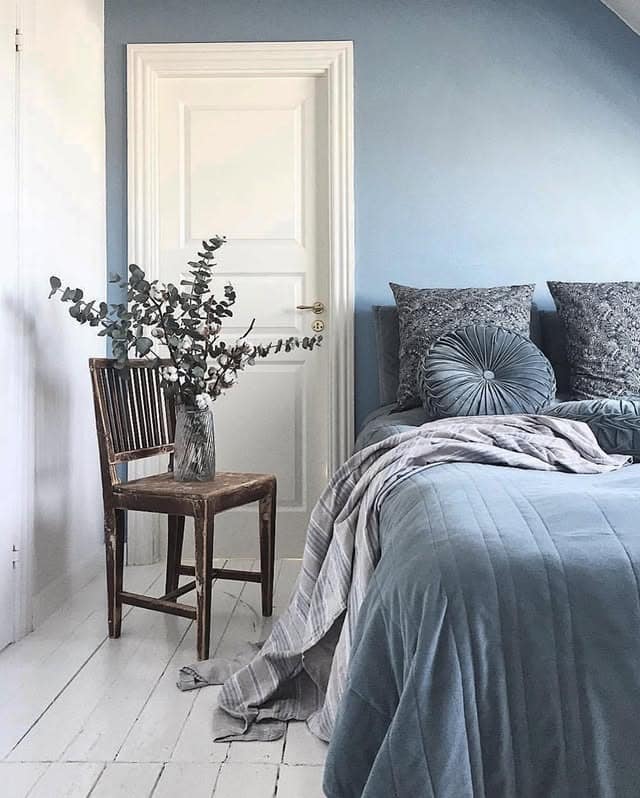 9. Muted Blue Bedroom with Rustic Touches - light blue bedroom ideas