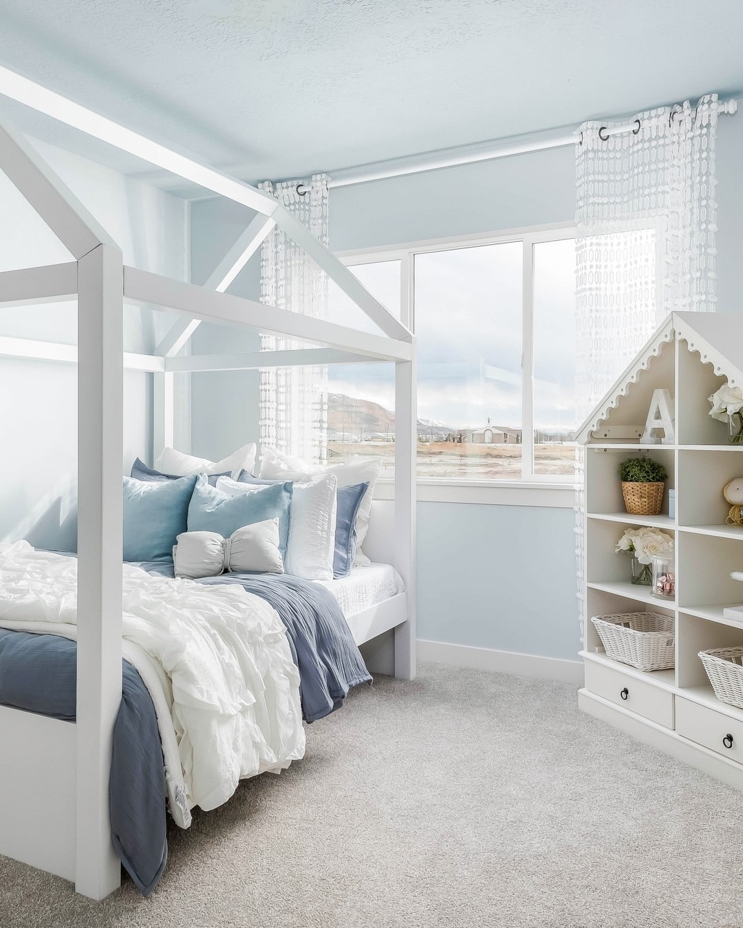 11. Soft Light Blue Bedroom with White Canopy Frame - light blue bedroom ideas