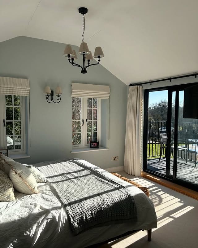 15. Minimal Light Blue Bedroom with Soft Natural Light - light blue bedroom ideas