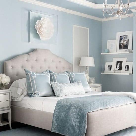 21. Elegant Light Blue Bedroom with Tufted Upholstered Bed - light blue bedroom ideas