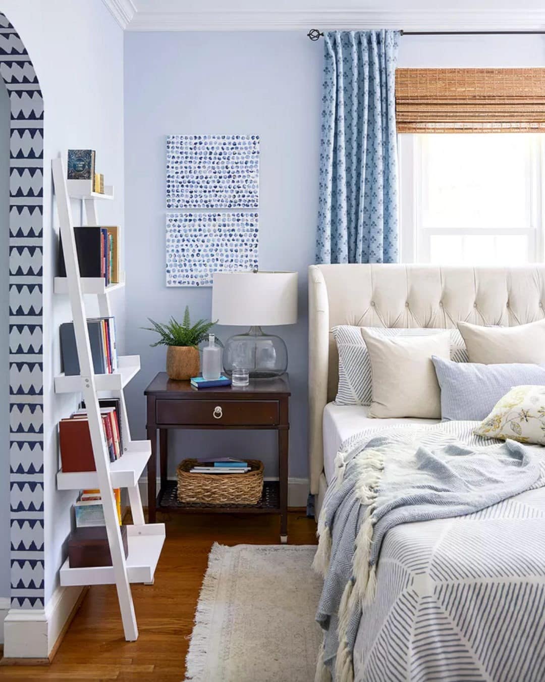22. Light Blue Bedroom with Patterned Textiles and Casual Storage Accents - light blue bedroom ideas