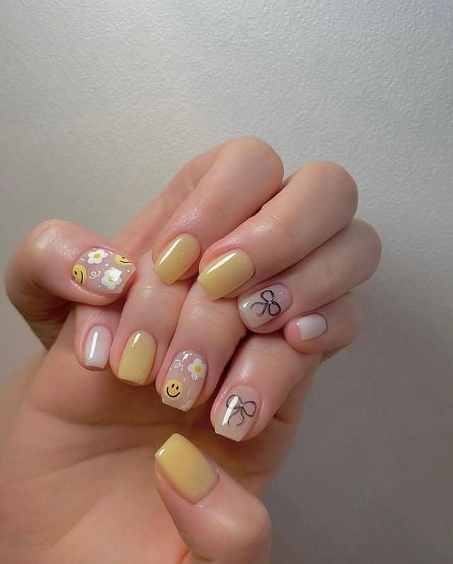 5. Pastel Yellow Playful Art Nails - basic nail ideas