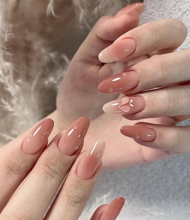 21. Glossy Peach Almond Nails with Dew Drop Accents - basic nail ideas