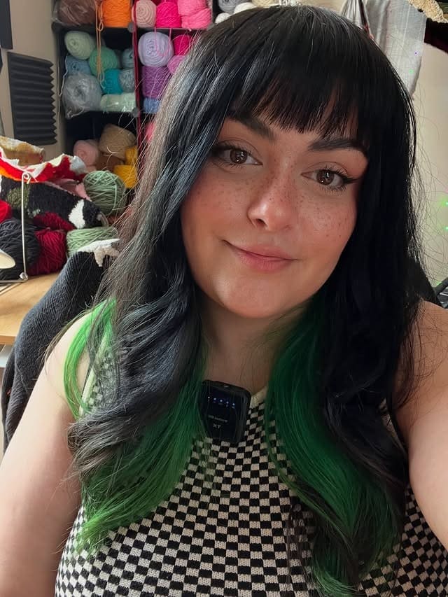 6. Jet Black Waves with Micro Wispy Bangs and Color Accents - Wispy Bangs For Wavy Hair