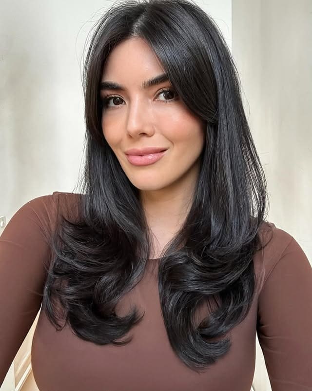 7. Glossy Espresso Layers with Soft Wispy Bangs - Wispy Bangs For Wavy Hair