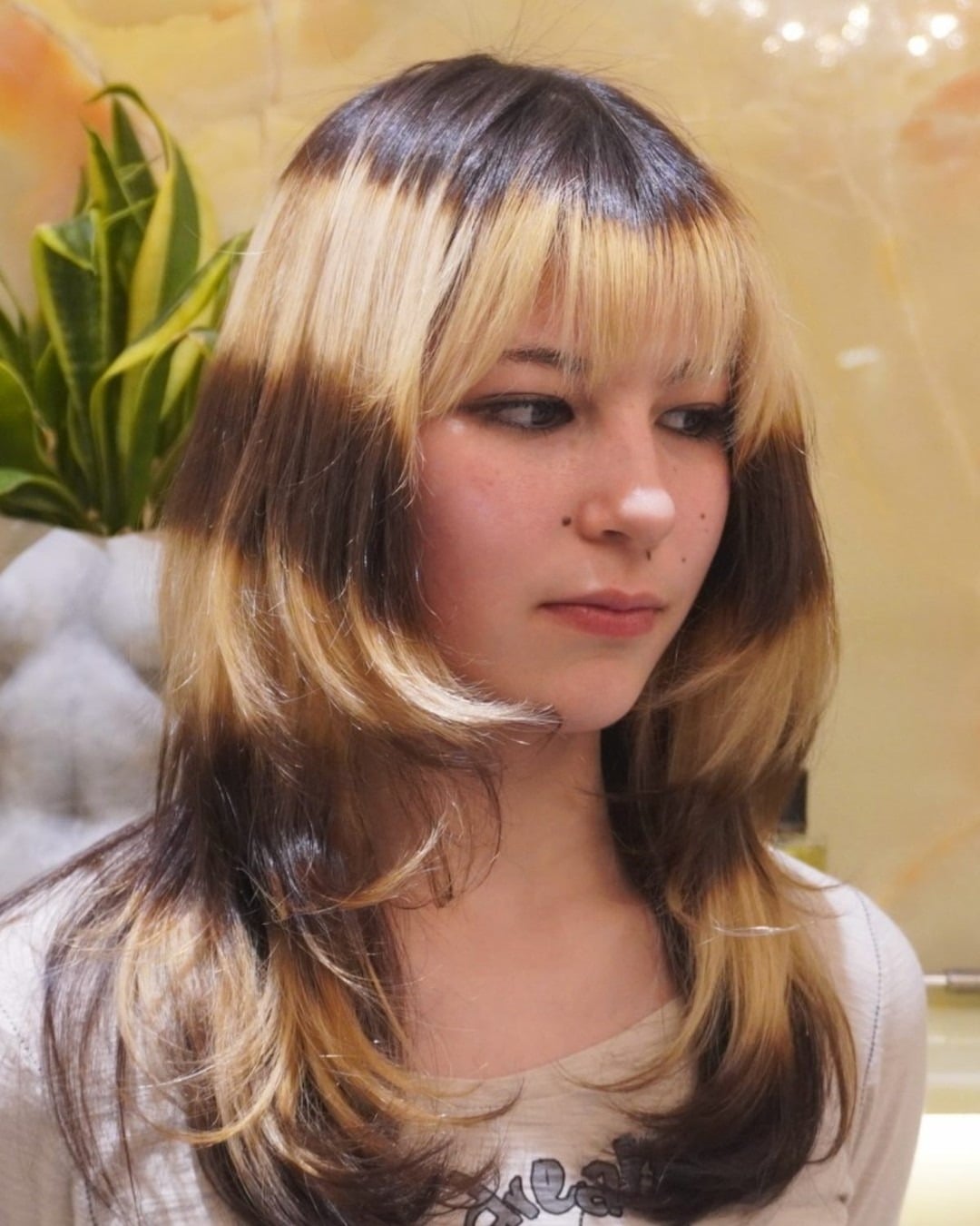 12. High-Contrast Blonde and Espresso Layers with Textured Bangs - Wispy Bangs For Wavy Hair