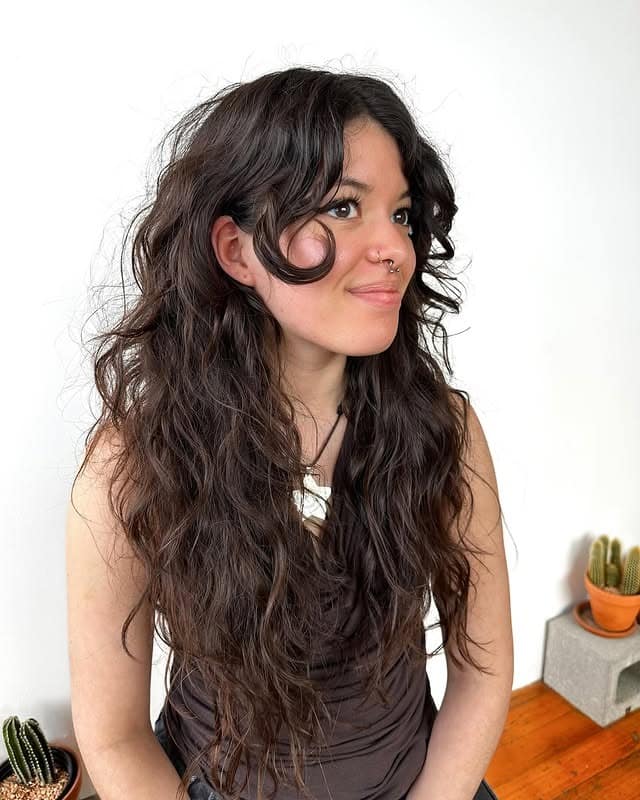 18. Natural Dark Brown Waves with Curved Wispy Bangs - Wispy Bangs For Wavy Hair