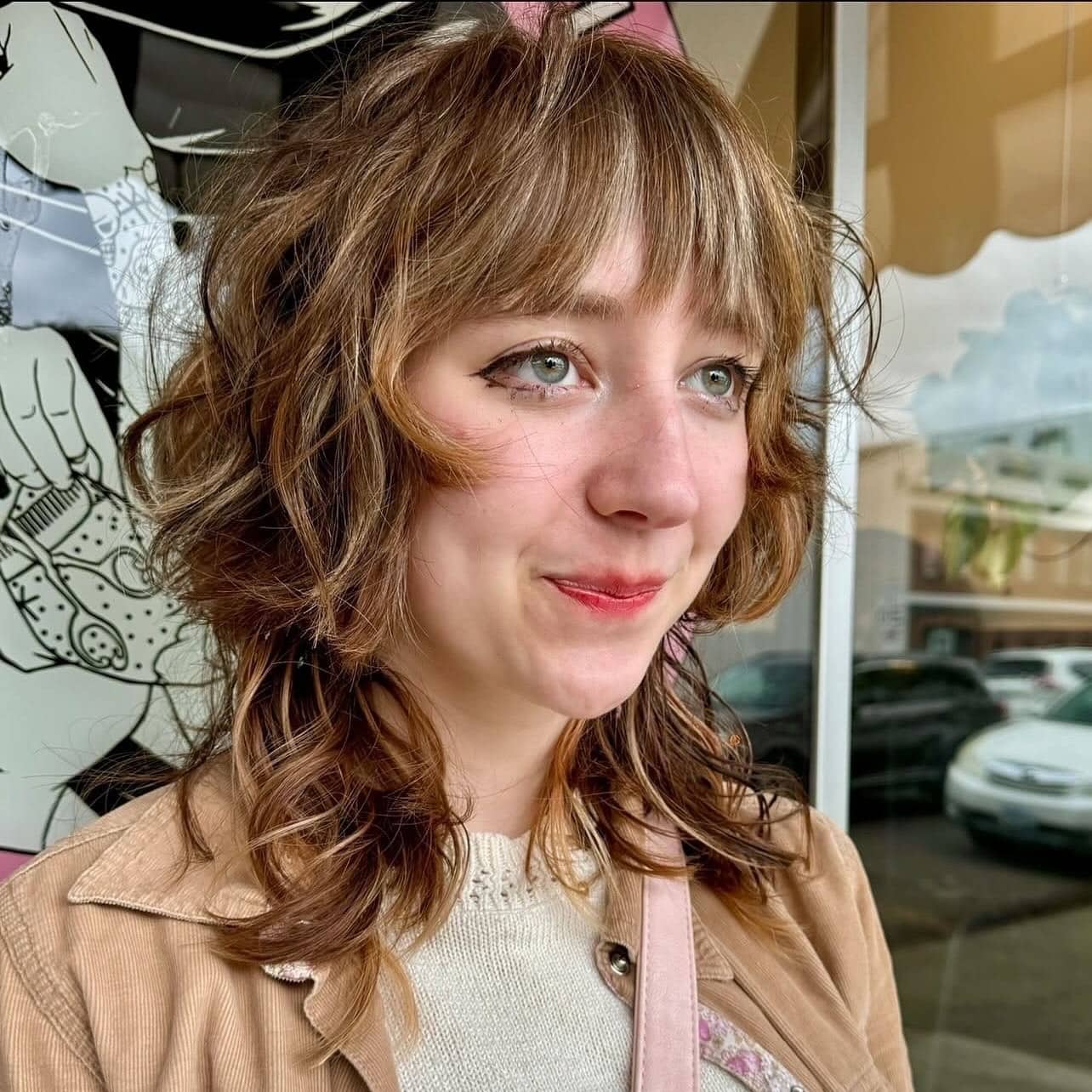 9. Short Shag Feather Fringe with Warm Caramel Highlights - Feather Fringe Hair