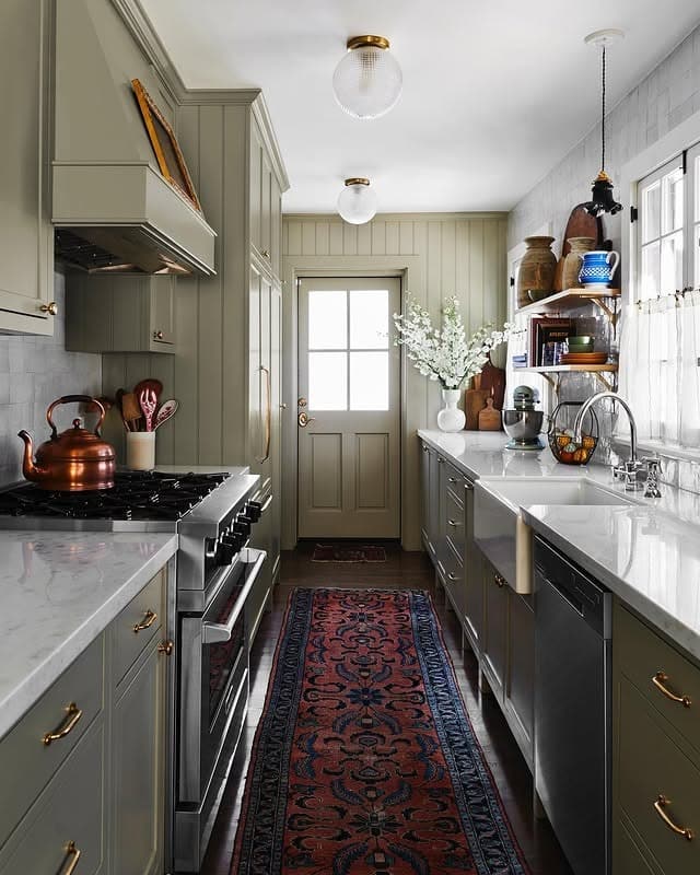 1. Classic Sage Galley Kitchen with Brass Accents - galley kitchen ideas