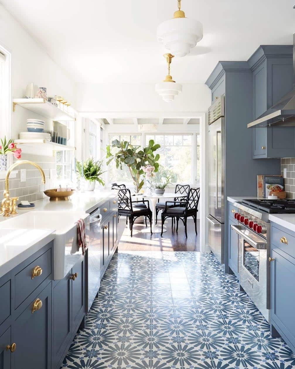 2. Navy and White Galley Kitchen with Patterned Tile Flooring - galley kitchen ideas