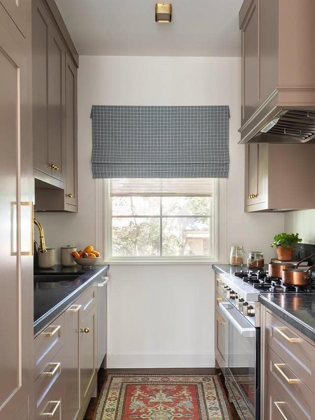 3. Warm Taupe Galley Kitchen with Dark Countertops - galley kitchen ideas